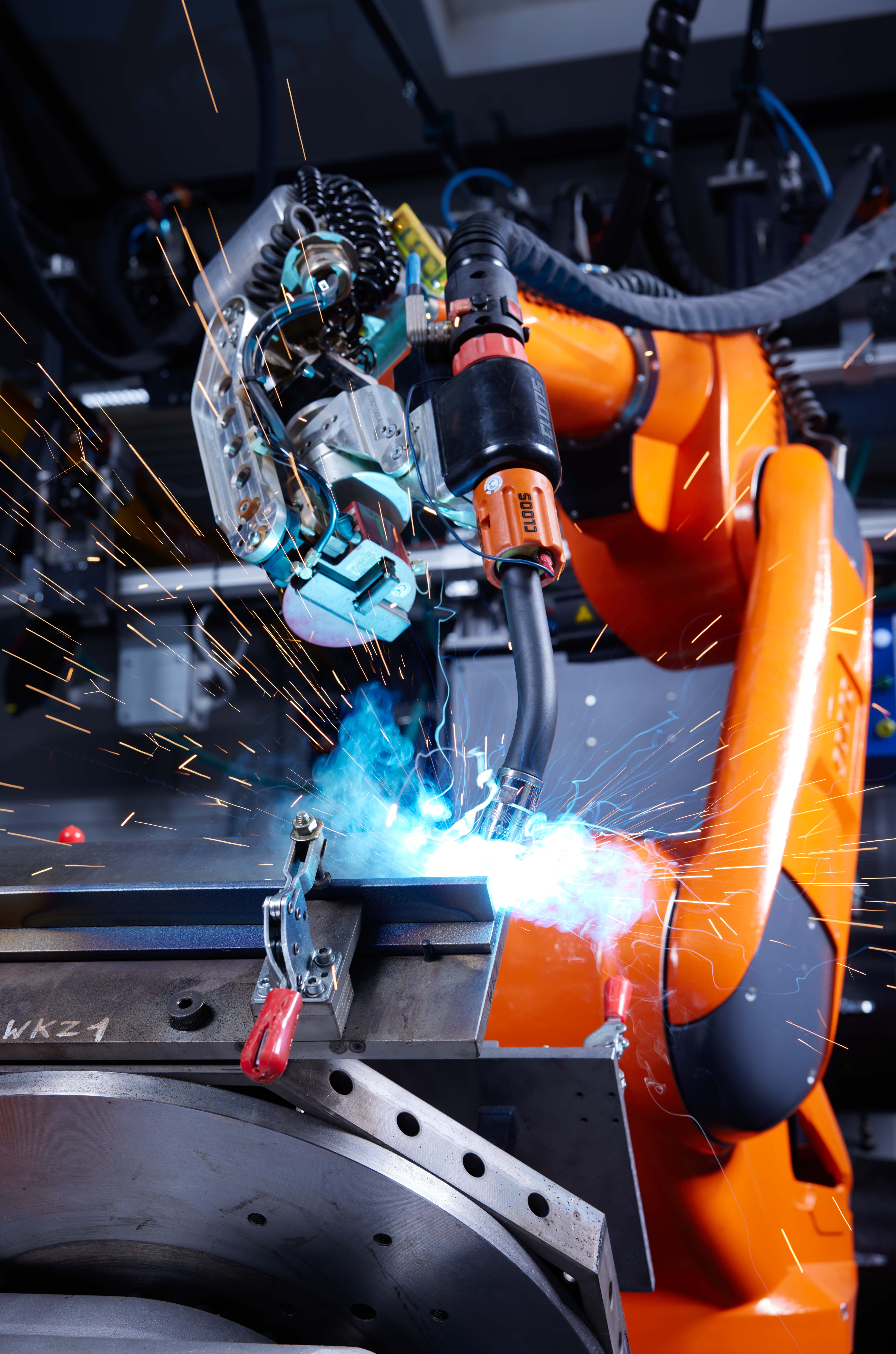 CLOOS industrial welding robots performing automated welding operations