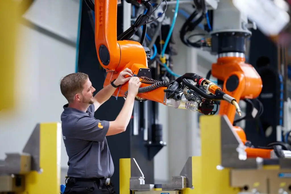 CLOOS welding automation industrial robot in manufacturing environment