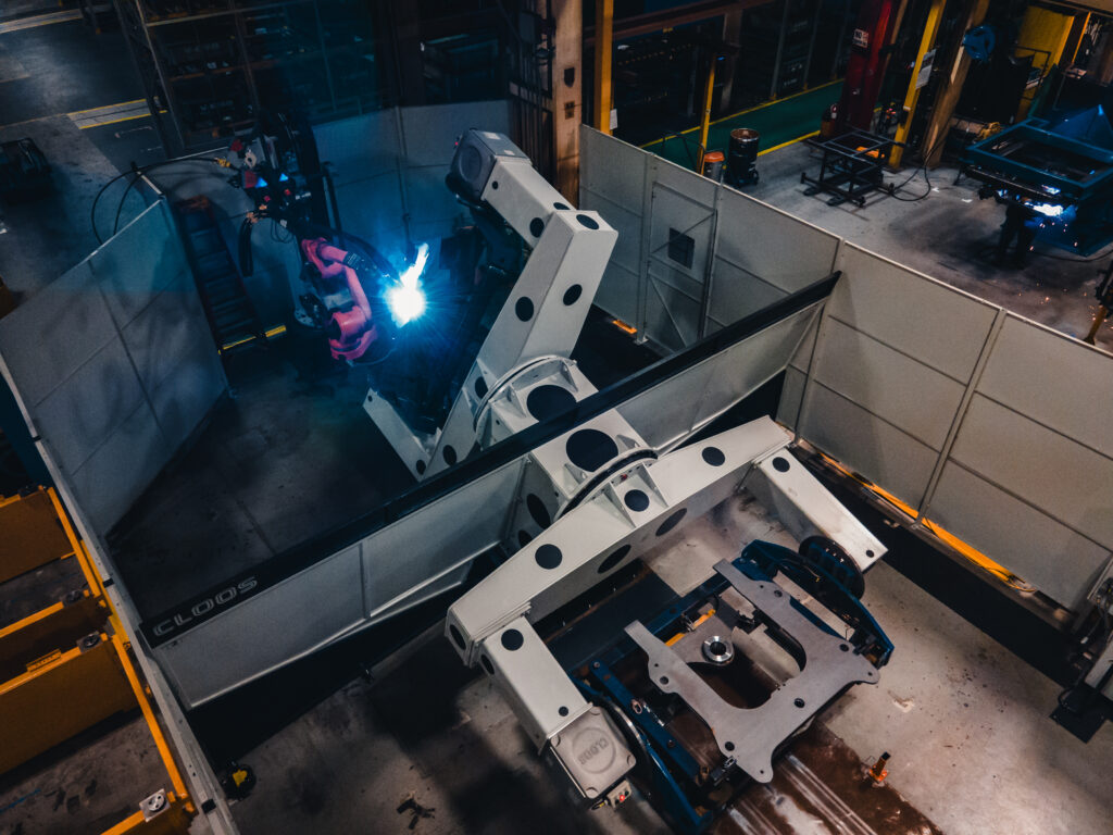 CLOOS robotic welder performing precision welds at Volvo truck factory